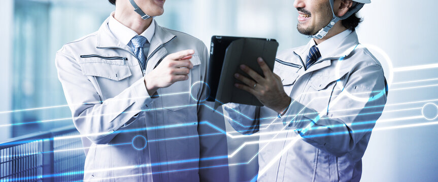 DX and IT in shipping and logistics warehouses Two men in work clothes Digital image  no-face