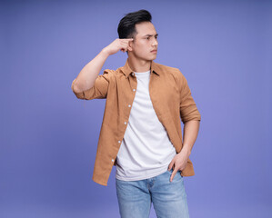 Photo of young Asian man on background