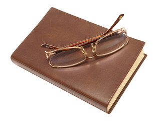 Glasses and book isolated