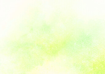 Obraz na płótnie Canvas 水彩の淡い黄緑色の抽象背景