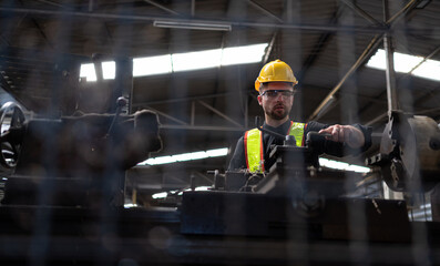 Mechanical engineers enter the old machinery warehouse to inspect and repair used machinery with the warehouse's personnel.