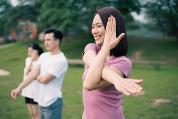 Group Asian people excercise at park