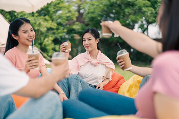 Group Asian people picnic outside