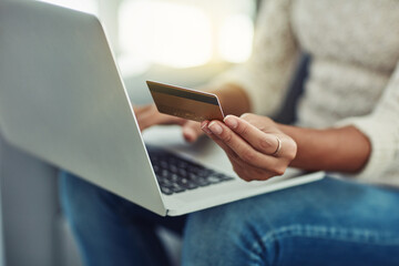 Laptop, credit card and woman online shopping with payment on the internet on her home living room sofa. Ecommerce, computer and hands of person doing website payment on an app, connection or web - obrazy, fototapety, plakaty