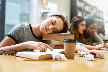 Woman, sleeping and books for studying at library, college and tired with stress, anxiety or burnout. University student, girl and sleep with education, study and fatigue with notes, school and desk