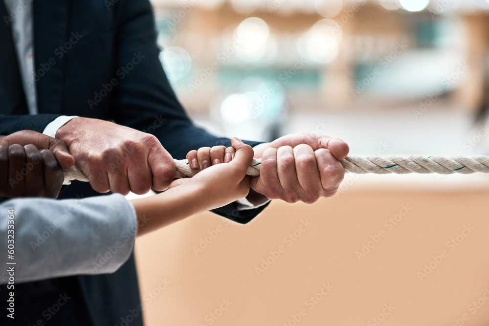 Poster hands, collaboration and rope with a business team pulling during a game of tug of war in the office