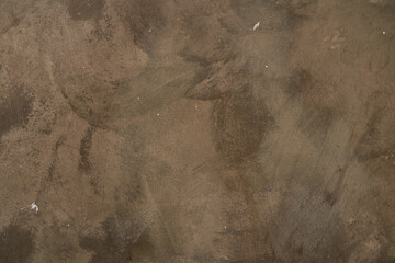 Rough and textured surface of the stone material. Overlay for your design with space to copy. The background of a stone wall with a rough texture. High quality photo