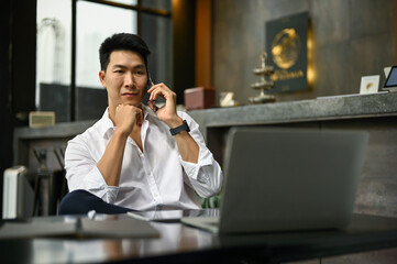 A businessman dealing business over the call, talking on the phone