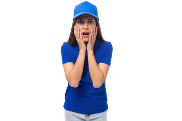 young caucasian brunette woman in blank blue t-shirt and cap