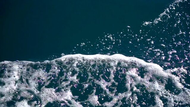 A sea wave from a boat. Slow motion video. The South China Sea. Not far from Nha Trang in Vietnam. 