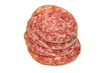 Cured salami sausage slices, Italian cuisine, isolated on white background.