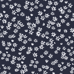 Seamless background with a primitive children's floral pattern. Simple minimalistic background, cute white flowers on a blue background. Children's wallpaper for the children's room, textiles.