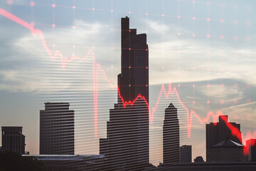 Falling red business graph grid on blurry city background. Crisis, recession and stock market concept. Double exposure.