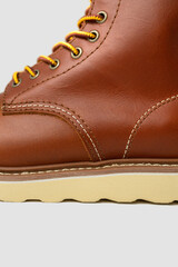 Closeup photo of brown shoes. leather boots