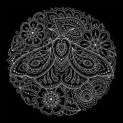Moth decorated with Indian ethnic floral vintage pattern. Hand drawn decorative insect in doodle style. Stylized mehndi ornament for tattoo, print, design for room, cover, book and coloring page.