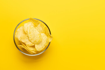 Bowl of chips on a yellow