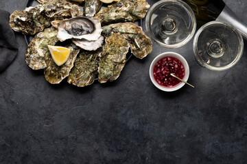 Fresh oysters with glasses of sparkling wine