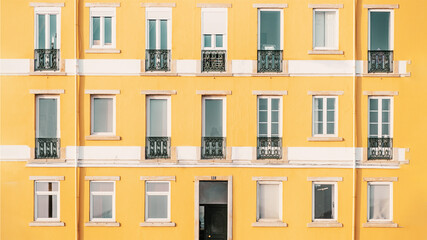 Blue Windows in Yellow House.