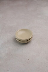 Empty plate or saucer on the table, isolated and copy space