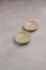 Empty plate or saucer on the table, isolated and copy space