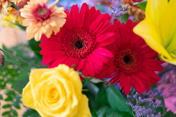 Celebration Valentine's Day Women's Day birthday holiday party. Close up cropped photo of bouquet of fresh flowers