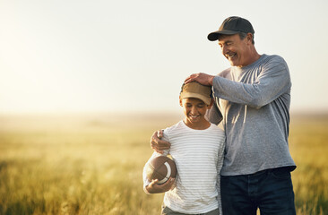 Father, son and rugby ball in a countryside field for bonding and fun in nature. Mockup, dad and...