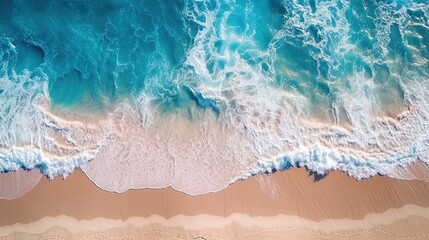 Fototapeta na wymiar Ocean waves on the beach as a background. Beautiful natural summer vacation holidays background. Aerial top down view of beach and sea with blue water waves