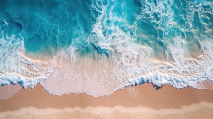 Ocean waves on the beach as a background. Beautiful natural summer vacation holidays background. Aerial top down view of beach and sea with blue water waves