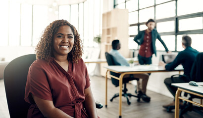 Portrait, happy woman in chair and boss at creative startup, leader in business project at design agency. Proud entrepreneur with creativity, idea and happiness, female ceo in happy African workplace