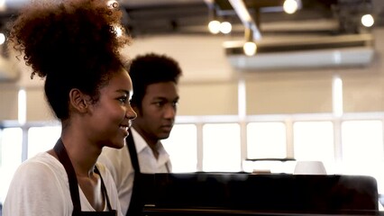 Barista coffee education class training concept, teacher or advisor explain coffee making process to young multiethnicity students, workshop learning for small business entrepreneurs or restaurants