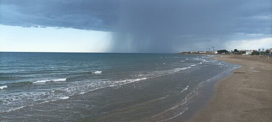 Storm Clouds Over Cold Sea Water. Stylized panoramic seascape