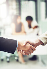 Collaboration, greeting and business people shaking hands in office after a meeting or interview....