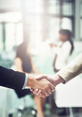Partnership, handshake and business people in office for a deal, collaboration or corporate...