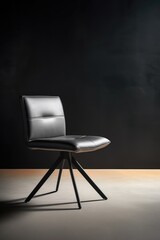 sleek and minimalist full body chair design takes center stage. The chair boasts a slender metal frame with a matte finish, accentuated by a cushioned seat and backrest