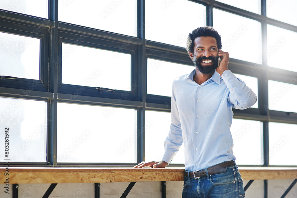 Wall mural Window, phone call and communication with a happy business man in the office with a smile or mindset of the future. Happy, mobile and contact with a male employee talking at work during his break