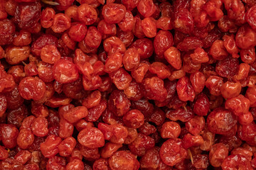 Close-up red dried cherry, full frame