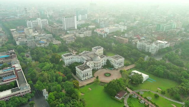 Kolkata: Aerial view of city in India, famous Maidan, massive green space with trails, riverside picnic spots, and sporting venues that include - landscape panorama of South Asia from above