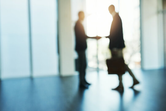 Handshake, Silhouette And Blur Of Business People In Office For Partnership, Collaboration And Agreement. Corporate, Recruitment And And Blurred Men Shaking Hands For Thank You, Welcome And Deal