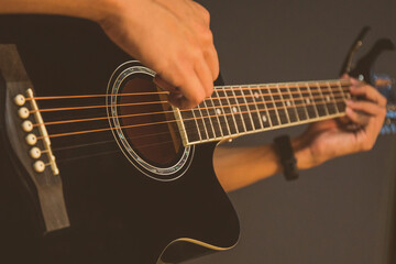 Fototapeta na wymiar Delicate and beautiful folk acoustic guitar 41 inches