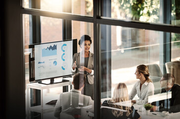 Business meeting, window and people presentation, company statistics and data analytics, charts or graphs.. Speaker, manager or african woman with staff for work results, revenue and profit on screen