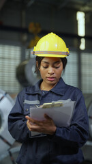Engineer woman examining and measuring steel at lathe factory, worker or technician check and maintenance metal with professional, industry and machinery concept.