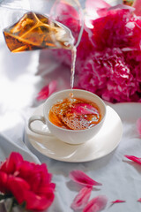 cup of tea with flowers