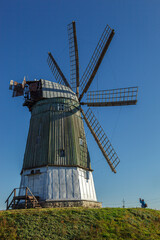 Fototapeta premium windmill dutch type against blue sky