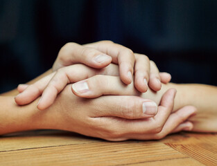Closeup, healing and holding hands with love, trust and hope in a crisis, empathy and support....