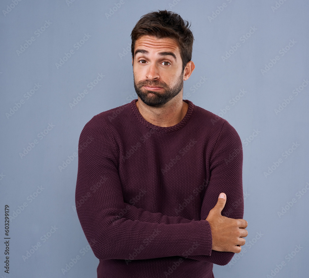 Poster unsure, confused and portrait of man in studio with confused, uncertain and thoughtful on blue backg