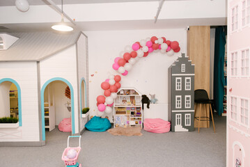 Design of a children's play center with houses and balls