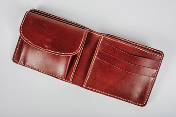 genuine leather wallet brown color on isolated white background.