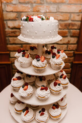 Delicious fancy wedding cake made of cupcakes