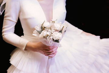 Wedding tradition the bride throws a bouquet to her girlfriends