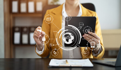 Person typing laptop computer and tablet with SDK icon on virtual screen. SDK Software development kit programming language technology concept in office.